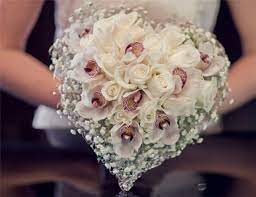 These photographers have traveled to just about every corner of the world to shoot weddings of all styles and traditions, and are reporting back to us on their findings. Heart Shaped Bouquet Wedding Bridal Bouquets Beautiful Bouquet Of Flowers Wedding