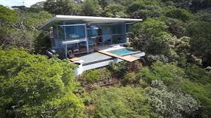 Especially if you make that flat roof usable with the addition of a roof top deck. Angular Flat Sloping Roof Covered Modern House Create A Enjoyable View