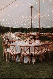 Open High Ceilings Wooden Poles Autumn Wedding Reception Tent Wedding Outside Wedding Decorations