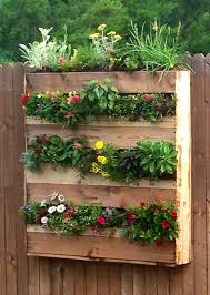 May 10, 2016 nick power 7 comments. Vertical Pallet Flower Box Garden Added Landscape Fabric Then Thick Plastic Then Plywood To The Ba Diy Herb Garden Box Garden Boxes Diy Garden Planter Boxes