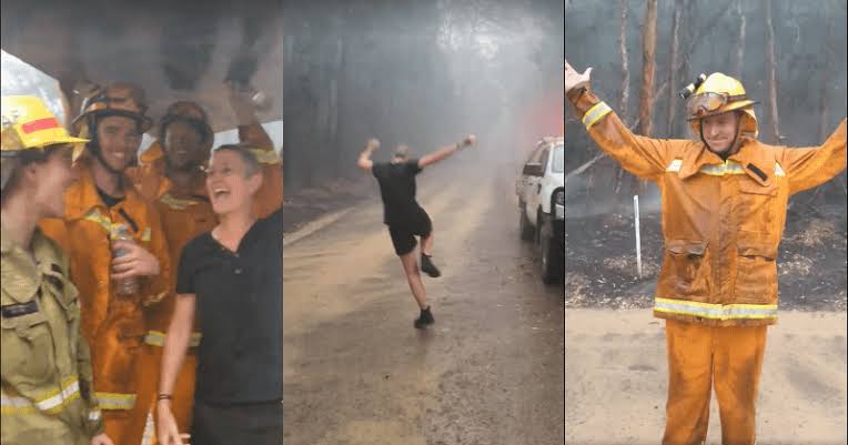 Image result for firefighters jump for joy as rain drenches NSW bushfire zone"