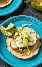 Grilled white fish, sweet mango salsa and crema for the the best grilled fish tacos and mango salsa. Sous Vide Spicy Fish Tacos Cook S Illustrated Recipe Sous Vide Recipes Spicy Fish Tacos Fish Tacos