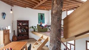 In A Gordon Matta Clark Like Intervention An Oak Tree Trunk Serves As A Structural Support For A House In Ghent By Atel House Unique Houses Alpha Tiny House