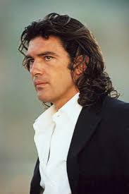 Antonio banderas with his hair styled in silky black curls. Antonio Banderas Handsome Actors Hollywood Actor Movie Stars