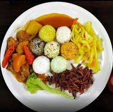 Nasi 7 benua, which means 'rice of seven continents', comprises seven types of local traditional. Nasi 7 Benua Koo Boo Cafe Jelajah Maya