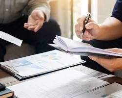 Image of person discussing insurance options with an insurance agent