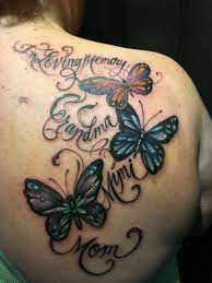 Beautiful Butterfly Tattoo In Memory Butterfly Tattoo Butterfly Tattoos For Women Butterfly Tattoo On Shoulder