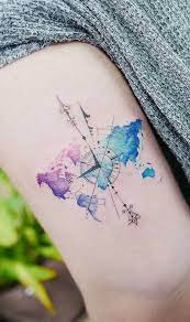 Watercolor compass tattoo on a side. Watercolor Tattoos Will Turn Your Body Into A Living Canvas Compass Tattoo Compass Tattoo Design Tattoos