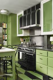 Dark green wooden kitchen cabinets. Here S How To Nail The Monochromatic Color Scheme Like A Pro Simple Kitchen Design Green Kitchen Interior Green Kitchen Designs