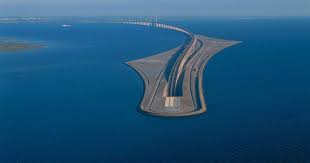 The bridge is called öresundsbron in sweden and øresundbroen in denmark. This Amazing Bridge Turns Into A Tunnel And Connects Denmark And Sweden Twistedsifter