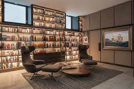 Floating shelves, installed with concealed brackets, update underused walls with streamlined storage and display space. 25 Home Office Shelving Ideas For An Efficient Organized Workspace