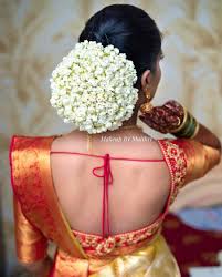 Hairstylerukku Hairstylerukku Added A Photo To Their Instagram Account Drooling Over This Floral Bu Bridal Hair Decorations Bridal Hairdo Bridal Hair Buns