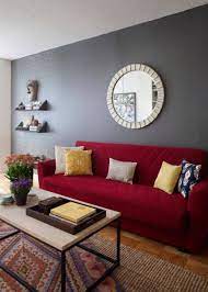Shelves On Wall With Horns Above Red Sofa Living Room Red Couch Living Room Red Sofa Living