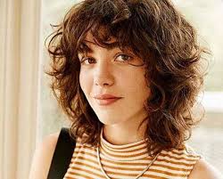 It features a curly fringe, too, for a pop of excitement. Short Curly Hair With Bangs Short Curly Haircuts Curly Bob Hairstyles Curly Hair Styles