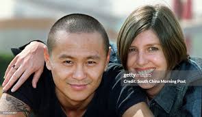 Mixed race couple, Tracy Driscoll from the UK, who works for the... News  Photo