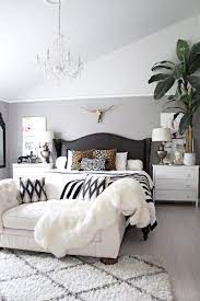 Bedroom Furniture Ideas A White Fur Coat Spreads Elegantly Across The Sofa A Bulls Head Graces The Bedroom Interior Master Bedrooms Decor Home Decor Bedroom