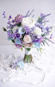 | / create a stunning wedding bridal bouquet or a simple fake flower arrangement with this white real touch rose stem. Lovely Images Of Floral Purple Wedding Bouquets Wedding Flower Arrangements Purple Bridal Bouquet