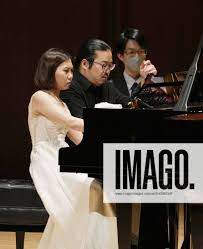 Pianists Kyohei Sorita, Aimi Kobayashi Pianists Kyohei Sorita (C) and Aimi  Kobayashi (L) perform at