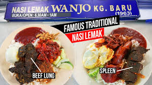 Nasi lemak is not as light and refreshing as the name suggests! Nasi Lemak Wanjo Kampung Baru Kuala Lumpur Traditional Flavours Youtube