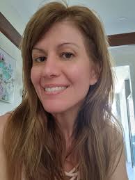 Who recommends for hair coloring in Aurora with auburn and purple  highlights?