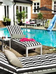 The versatility of black and white stripes allows them to be introduced in a variety of settings such as the deep blue sofa and the dark wooden furniture look great in combination with the rug and the other black and white accents in the room. 7 Trendy Deck Decorating Ideas For Spring My Monochrome Stripe Addiction Betterdecoratingbiblebetterdecoratingbible