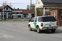 A helicopter blocks us, sitting in the road with border patrol vehicles scattered around. United States Border Patrol Wikipedia