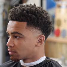 Leaving hair longer on top gives you lots of room to play with different textures and techniques like. Fade Haircut For Black Men High And Low Afro Fade Haircut December 2020
