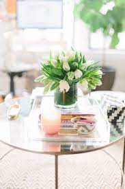 20 Chic Ways To Freshen Up Your Coffee Table Living Room Side Table Home Decor Decorating Coffee Tables