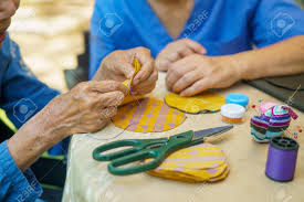 Plus, learn about loads of cool crafts that are great to make with young grandchildren! Elderly Woman With Caregiver In The Needle Crafts Occupational Therapy For Alzheimera S Or Dementia Stock Photo Picture And Royalty Free Image Image 147443660
