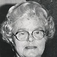 Miss Millie Booth well known music teacher from Elizabeth St and her dog.  From Herbert and Mary Jackson archive.