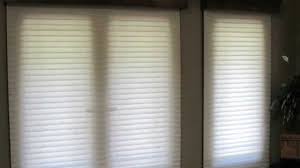Ring curtains with attached valances covering 1 set of french doors and 1 double window. Window Treatments For French Doors The Video Bellagio Window Fashions
