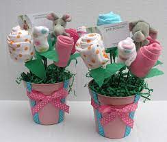 Baby Shower Centerpiece Onsies And Socks Flower Bouquet Baby Shower Decorations Baby Shower Crafts 2nd Baby Showers