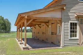 Sliding or overhead doors per plan. The Pole Barn Vs The Timber Frame Barn