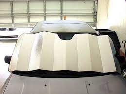 Use a car sun shade and a thrifted fitted sheet (including the elastic!) to make a sun shade for your kiddo's car seat. Make A Custom Fitted Sunshade 8 Steps With Pictures Instructables