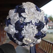 There are lots of flowers that come in natural shades of blue, such as blue dandelions, morning glories, and blue carnations. Amulti Wedding Flowers Bride Bridal Bouquet Brooch Bouquet Bridesmaid Bouquet Navy Blue Silver Buy Online In Andorra At Andorra Desertcart Com Productid 62077513