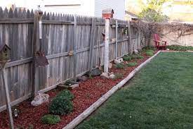 Tracy S Trinkets And Treasures Backyard Flowerbeds Landscape Timbers Front Garden Landscape Landscaping Timbers