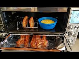 This technique offers less mess and evenly cooked meaty strips. Air Fryer Breville Smart Oven Bacon Egg Cheese Breakfast Cookingwithdoug Style Youtube Toaster Oven Recipes Bacon In The Oven Smart Oven