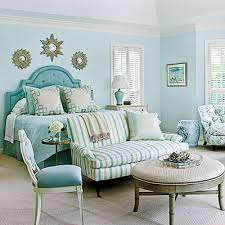 A aqua and gray chevron nursery featuring aqua walls and chevron accents throughout including curtains, bedding, blankets, lamp. 50 Shades The Best Of Aqua Home Decor The Cottage Market