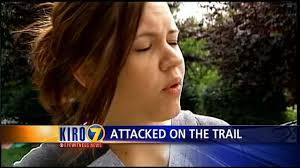 Woman saved from attacker after dogs come to rescue