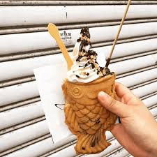 Aboong Is A Fish Shaped Waffle With A Delicious Creamy Filling Like Red Bean Paste Or Custard Topped Off W Korean Street Food Ice Cream Toppings Street Food