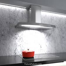 A black range hood is kind of unexpected and looks just great! Futuro Futuro 36 Idea Wall Range Hood