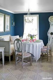 This homey blue dining room says a lot about a comfortable space while you dine and have fun! 18 Best Dining Room Paint Colors Modern Color Schemes For Dining Rooms