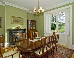 Olive green and yellow are a beautiful pairing, often found in nature. Wall Color Olive Green Is Trendy Decor10 Blog Green Dining Room Living Room Green Green Wall Color