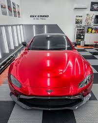 Image result for Amethyst Red 2011 Aston Martin