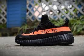 Black And Pink Yeezys The Yeezy V2 Orange And Black Is One Of The Most Wanted Shoes Right Now With The Boost Material In The Sol Sneakers Retro Basketball Shoes Adidas Yeezy 350 V2