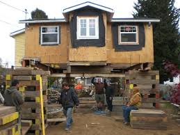 Adding a basement to your home requires digging out the soil around the house. Foundation Systems Restoration Repair New Basement House Raising Foundation Replacement Pier And Beam In Seattle
