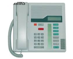 Insert the button label strip back on the telephone. Nortel Business Series Terminal T7208 Digital Phone