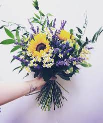 You can buy sunflowers in a florist or even grow your own sunflowers in the garden. Mj S Happy Flower Sunflower Janet S Lavender Sunflower Bridal Bouquet Sunflower Wedding Bouquet Sunflower Wedding Decorations