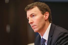 Bryan Seeley is charged with enforcing college sports' new rules. What's  his plan?