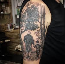 Colorful tattoo with nice flowers 19. Meaningful Fatherhood Father And Son Tattoo Design